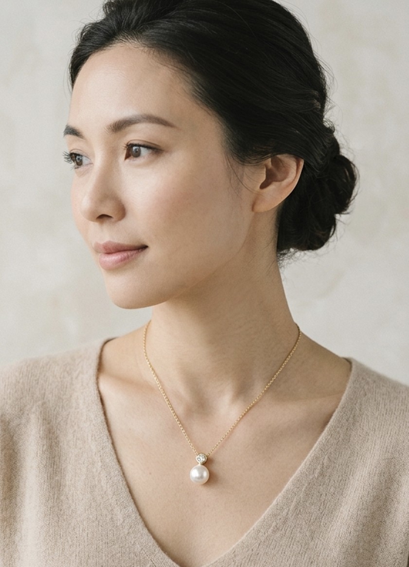 AI model wearing gold necklace in studio portrait