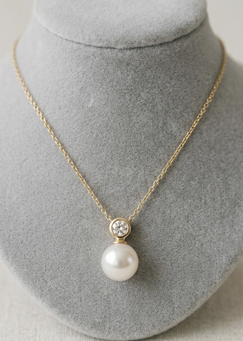 Gold necklace flat lay product photo